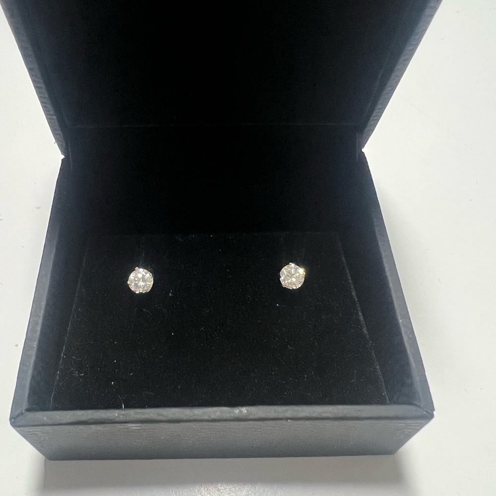 Round brilliant diamond stud earrings - .66tcw, g color, vs1